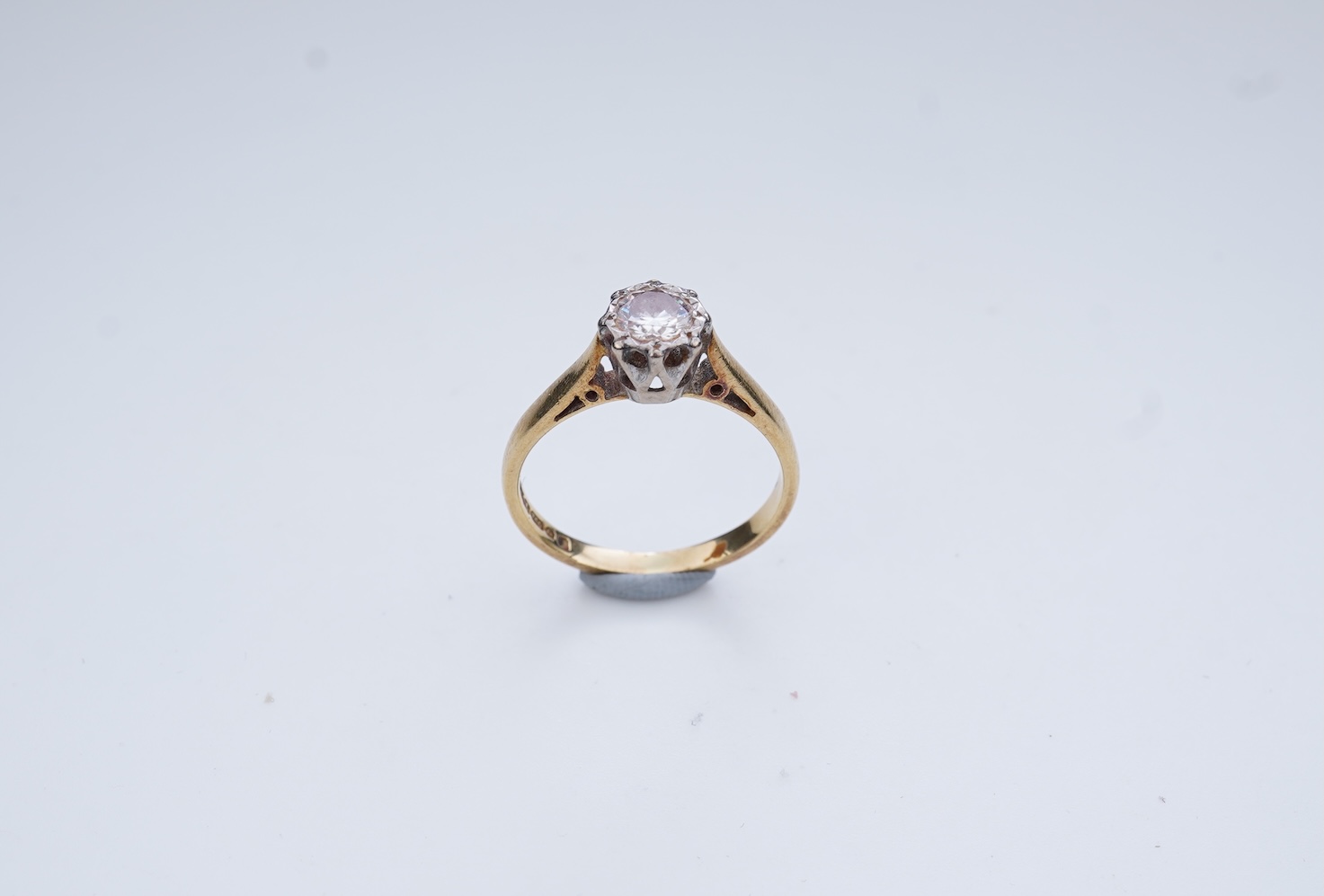 A diamond solitaire ring